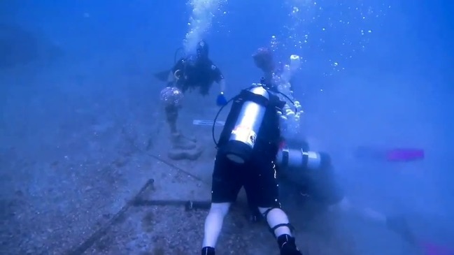 Disabled Veterans Dive to Clean Tampa Underwater War Memorial