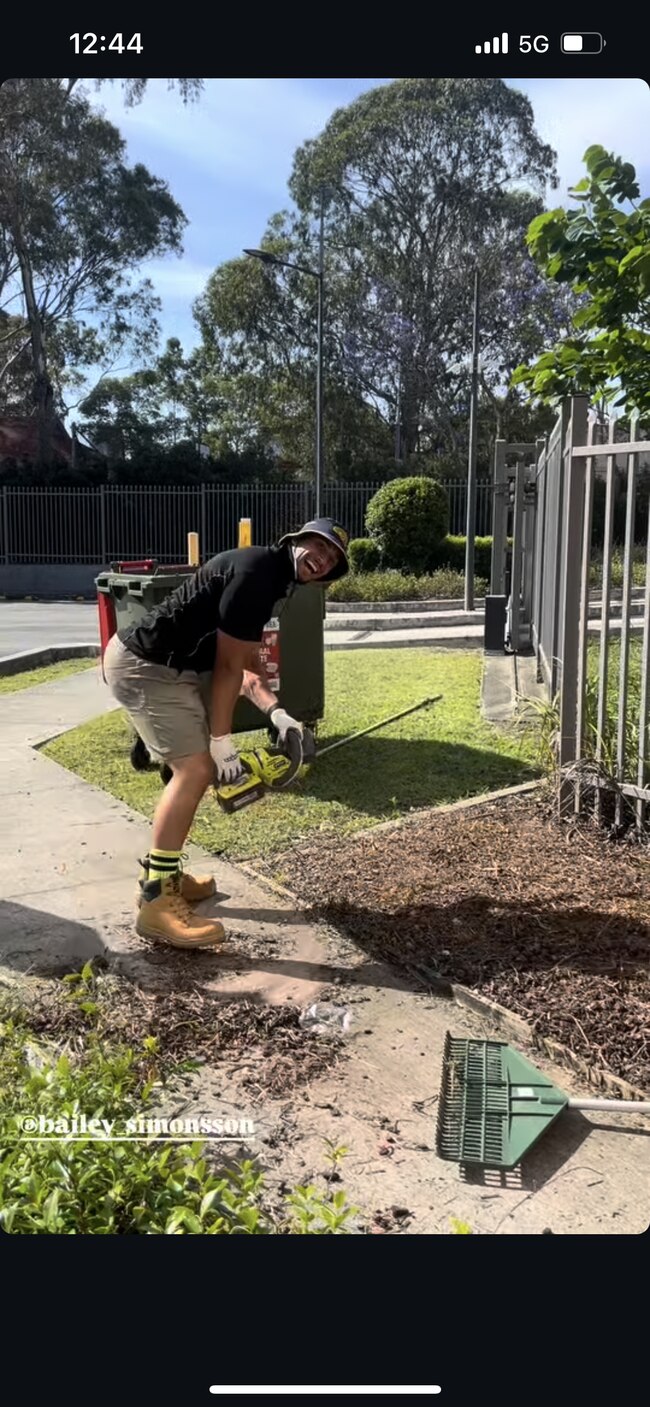 Bailey Simonsson mowing lawns on Monday