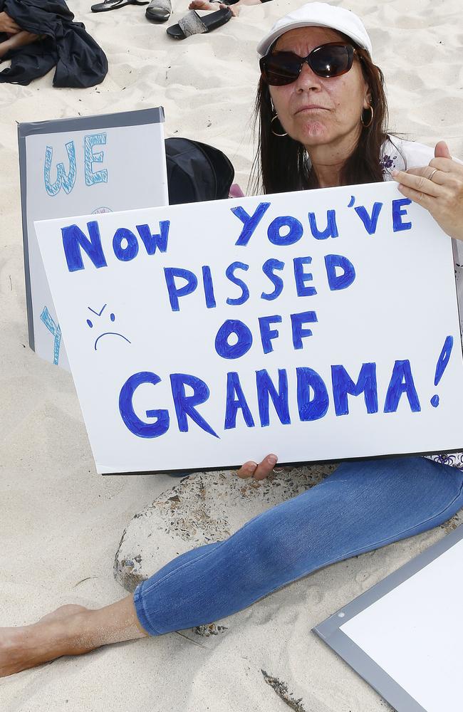 Elisa Profino from Chifley joins protesters on the beach. Picture: John Appleyard