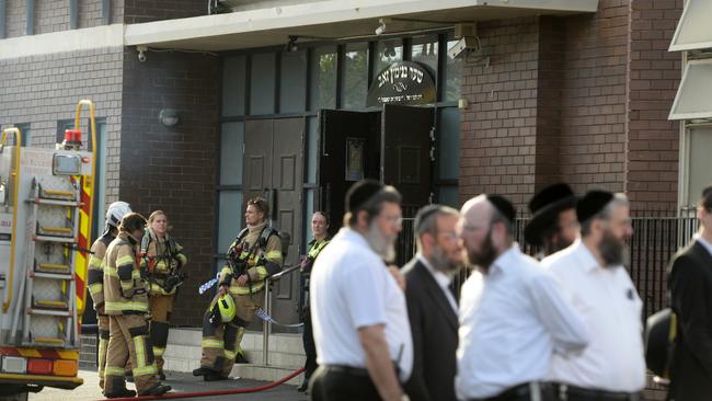 People gather outside the Adass Israel Synagogue. Picture: NewsWire/ Andrew Henshaw