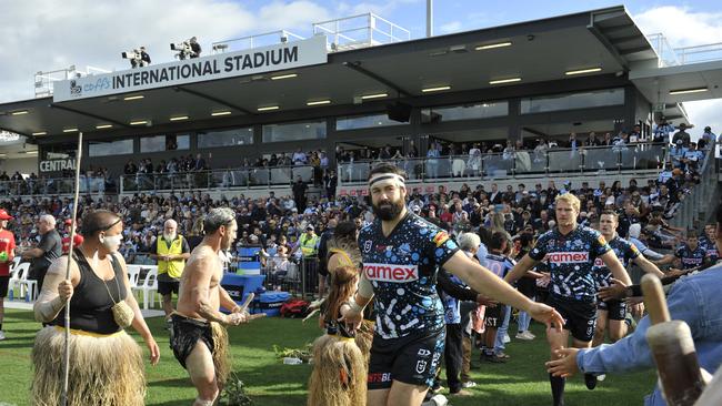 Aaron Woods runs out ahead of the clash between the Cronulla Sharks and the Gold Coast Titans at C.ex Stadium in May. Photo: Tim Jarrett