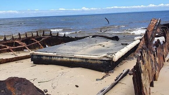 Flood debris, including pontoons and boats dragged away dragged away in the Southeast Queensland floods have started washing up on beaches. This pontoon washed ashore on Tuesday or Wednesday on Moreton Island. Picture: The Ice Man/facebook.com/TeewahBeach