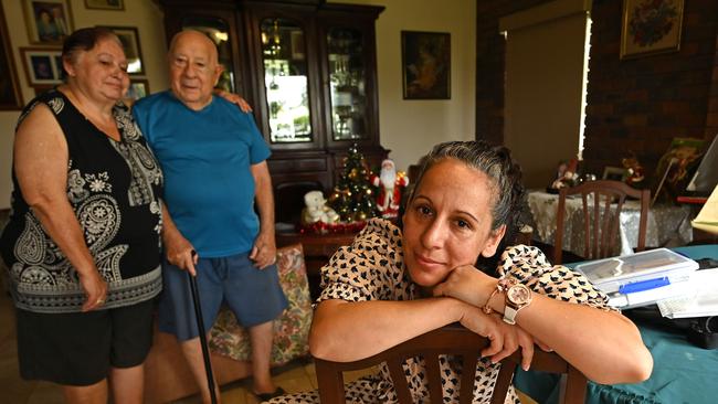 Mina Cullen with her parents Eva and Nicholas Comino, aged 72 and 82, who had to wait more than six hours for a PCR test in Brisbane. Picture: Lyndon Mechielsen