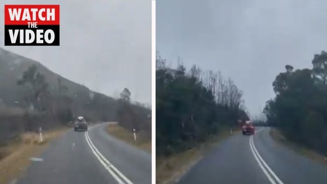 Snow falls on the way to Lake Pedder