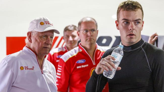 A rattled Scott McLaughlin with Dick Johnson and members of his team. Picture: Supercars Australia