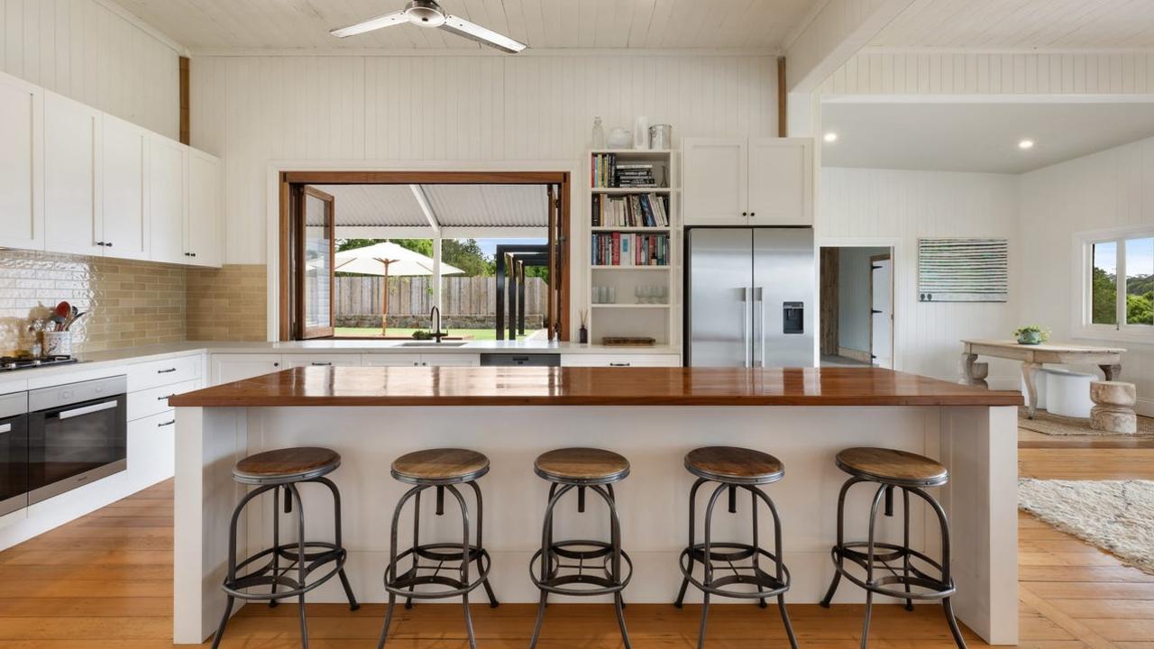 The kitchen is fitted with Miele appliances and adjoining butler’s pantry/laundry.