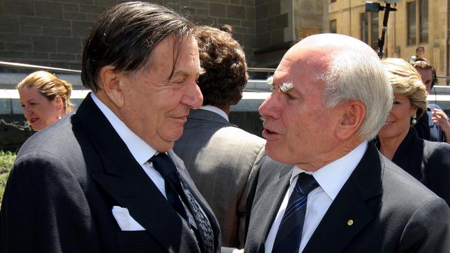 Barry Humphries and former prime minister John Howard after the Dame Elisabeth Murdoch state memorial service at St Paul's Cathedral, Melbourne.