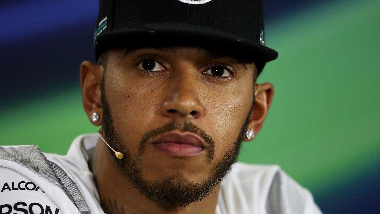 MELBOURNE, AUSTRALIA - MARCH 17: Lewis Hamilton of Great Britain and Mercedes GP in the Drivers Press Conference during previews to the Australian Formula One Grand Prix at Albert Park on March 17, 2016 in Melbourne, Australia. (Photo by Lars Baron/Getty Images)