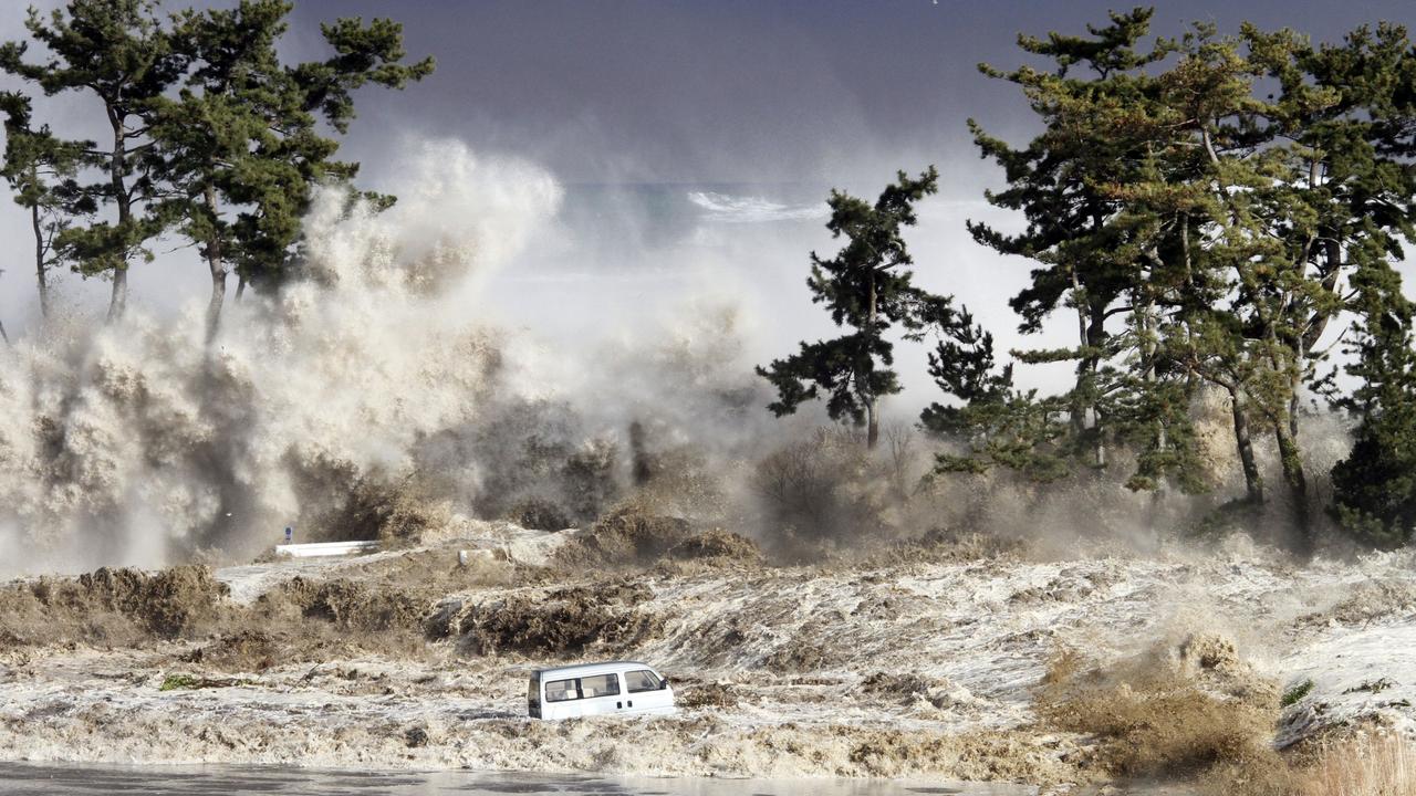 Tsunami waves hitting the coast of Minamisoma in Fukushima prefecture, Japan.