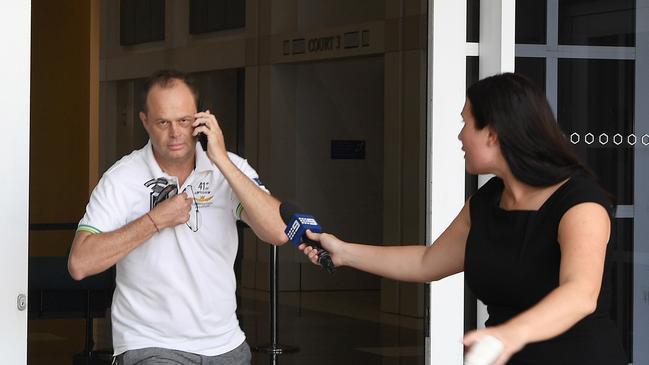 Robert Rowe, 49, running from the Supreme Court in Darwin last October after pleading guilty to accessing and possessing child abuse material via the internet.