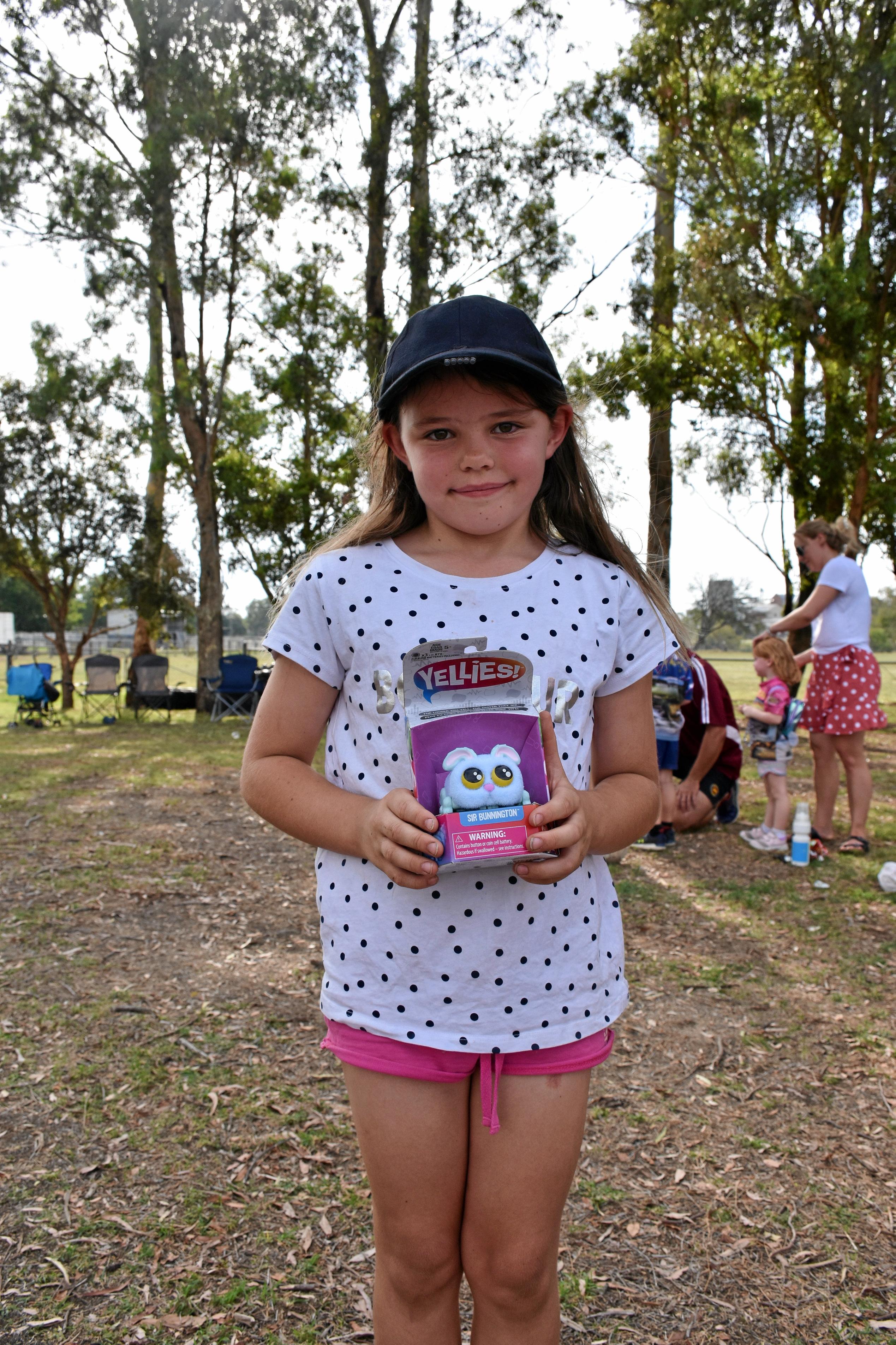 Indy Atkinson, 5, with her new present from Santa. Picture: Emily Clooney