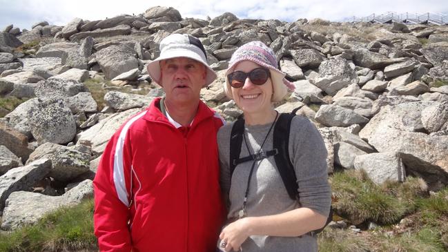 Paul Holmes with his support worker Nicole Kukielka, who helped him to climb the tallest peak in Australia, Mt Kosciuszko.