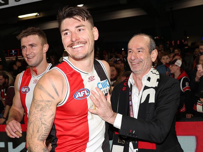 Andrew Bassat and departing defender Josh Battle earlier this year. Picture: Kelly Defina/Getty Images