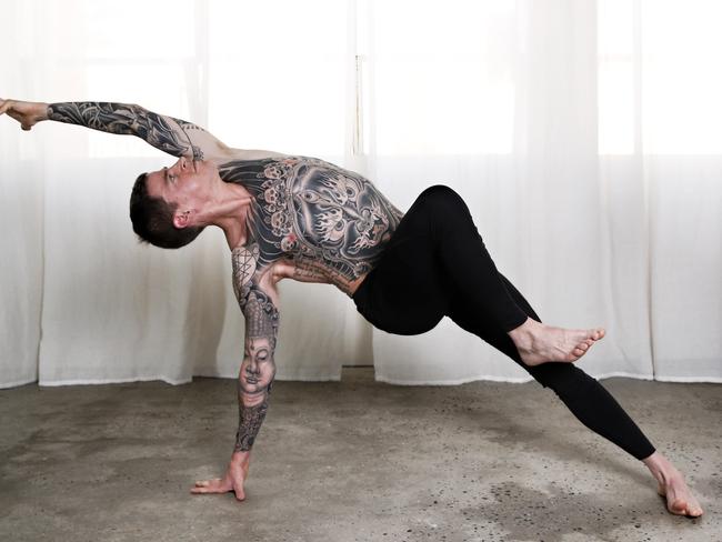 Jockey Nick Hall practising yoga at One Hot Yoga, South Yarra. Pic: Michael Klein
