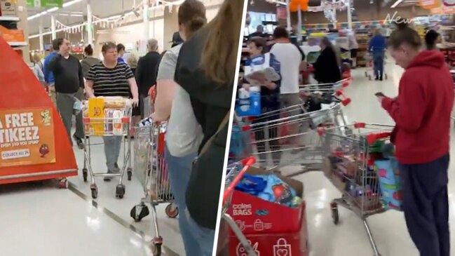 Crazy queues as shoppers continue panic buying