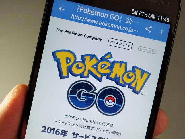 This photo illustration taken in Tokyo on July 13, 2016 shows the Pokemon official site through a Japanese internet website announcing the latest information for "Pokémon GO". With Pokemon-mania sweeping the planet, Nintendo's nascent shift into mobile gaming has proved a massive hit, vindicating the Japanese videogame giant's decision to unshackle itself from a long-standing consoles-only policy. / AFP PHOTO / KAZUHIRO NOGI / TO GO WITH Japan-US-IT-Nintendo-Pokemon-lifestyle,FOCUS by Harumi OZAWA