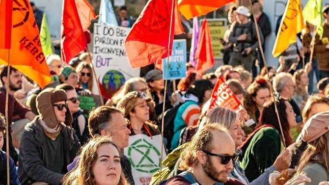 SOCIAL MEDIA IMAGE DISCUSS USE WITH YOUR EDITOR - PROTEST DISRUPTION: Extinction Rebellion protesters were charged after blocking roads and creating chaos in Brisbane's CBD in their quest for climate action. Picture: Extinction Rebellion SEQ