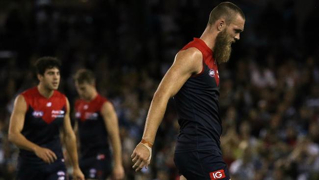 Max Gawn leaves the field after hurting his hamstring. Picture: Wayne Ludbey