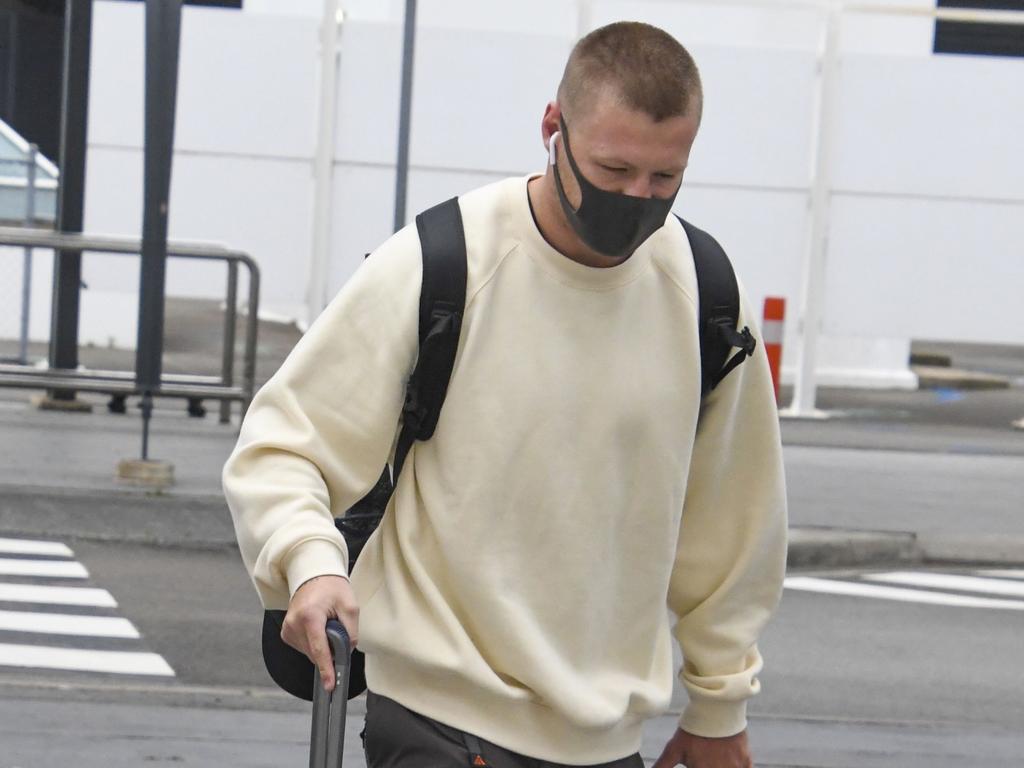 de Goey arriving back in Australia at Sydney Airport after his arrest.