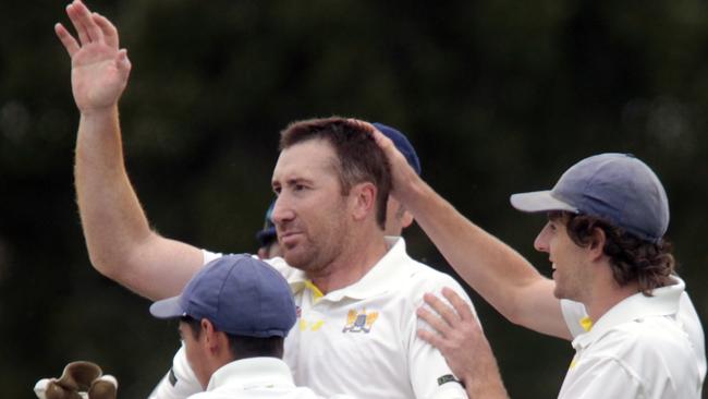 Dale Christie celebrating a wicket for Ormond in the 2014-15 grand final.