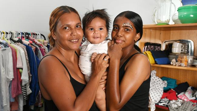 Naomi Leftwich with her son Darius, 6mths, and daughter Hazeldawn , 13, inside the Garbutt Community Centre. Picture: Shae Beplate.