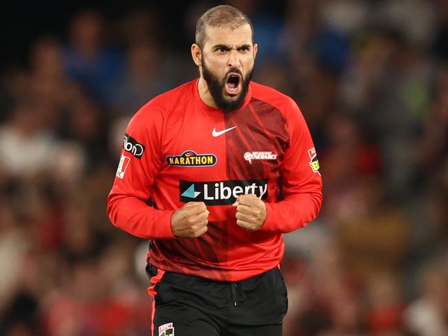 MELBOURNE, AUSTRALIA - JANUARY 24: Fawad Ahmed of the Renegades celebrates taking the wicket of Travis Head of the Strikers during the Men's Big Bash League match between the Melbourne Renegades and the Adelaide Strikers at Marvel Stadium, on January 24, 2023, in Melbourne, Australia. (Photo by Robert Cianflone/Getty Images)