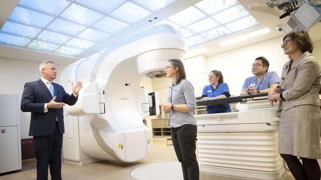 Tasmanian Health Minister Jeremy Rockliff, Chief Radiation Therapist Bronwyn Hilder, Radiation Therapist Jen McNickle, Radiation Therapist Alton Ma and Director of Radiation Oncology Associate Professor Marketa Skala with the new linear accelerator at the RHH. Picture Chris Kidd