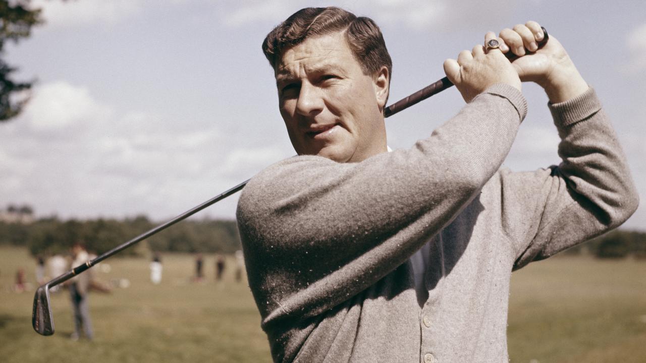 Five-time British Open champion Peter Thomson demonstrates his golf swing.