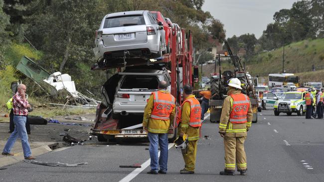 The scene in 2010, in which truckie John Posnakidis died when an out-of-control semi trailer hit his car carrier, which had broken down.