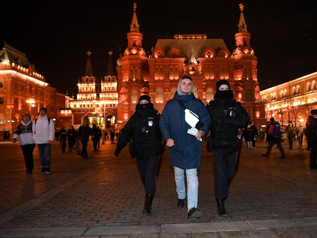 Riot police officers detain a man during a protest against Russia's invasion of Ukraine in central Moscow on March 2. Picture: Kirill Kudryavtsev / AFP