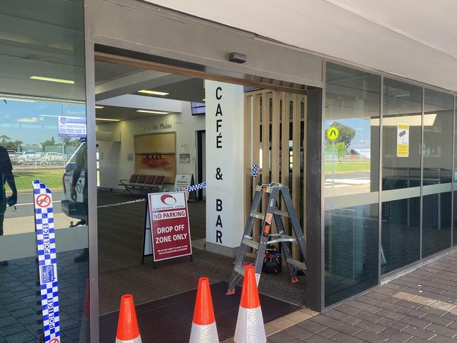 The scene after two cars hit the Dubbo Airport doors on Tuesday morning