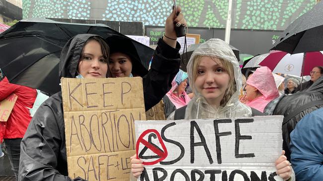 SYDNEY, AUSTRALIA, NewsWire, SATURDAY 02 JULY 2022  Hundreds of Australians have braced wild weather to march in support of abortion rights after the United States Supreme Court this week overturned Roe v Wade stand in solidarity. Sydney Town Hall Picture: NCA NewsWire / Monique Harmer