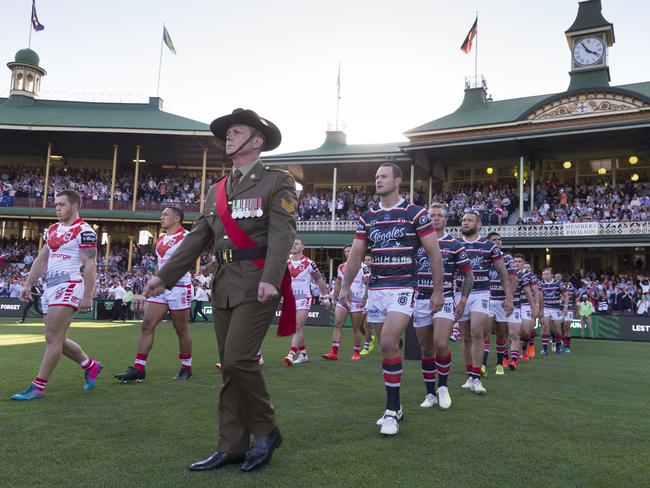 The Roosters and Dragons walk out onto the SCG for the 2019 ANZAC DAY match. Picture: AAP Image/Craig Golding