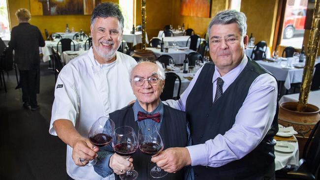 Cork &amp; Cleaver owner Stratos Pouras (centre) with head chef Greg Favretto and manager Jim Boutsis. The trio have spent the best part of their lives running the beloved Adelaide restaurant, which will close its doors for the final time next month. Picture Mark Brake