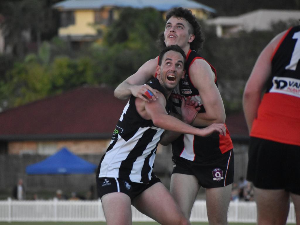 Nick Thiele (left) and Tyler Duck in the North Mackay Saints v Mackay Magpies AFL premier grand final, September 11, 2021. Picture: Matthew Forrest