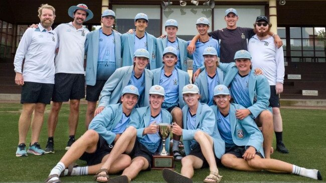 Geelong Grammar has won the APS cricket 2022-23 premiership. Pictured is (L-R) teacher in charge Jye Hearps, co-coach Matt Gunther, players, assistant coach Charles McCartin and team manager Matthew Walsh with the Tait Cup following their Round 9 win. Co-coach Shaun Dean is absent. Picture: Supplied.