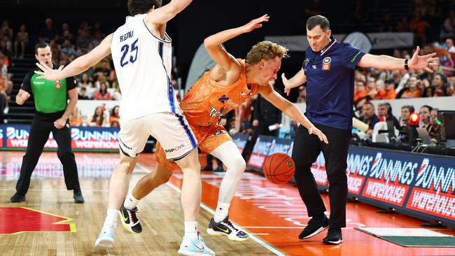 Taipans' Kyle Adnam loses possession of the ball over the sideline in the National Basketball League (NBL) match between the Cairns Taipans and the Adelaide 36ers, held at the Cairns Convention Centre. Picture: Brendan Radke