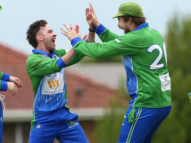 GDCA Cricket: Diggers Rest Bulla v East Sunbury: Lachlan Wilkins (2nd left) of East Sunbury celebrates with team mates after taking the wicket of Rhys Berry of Diggers Rest Bulla on Saturday, December 4, 2021 in Diggers Rest, AustraliaPhoto: Hamish Blair