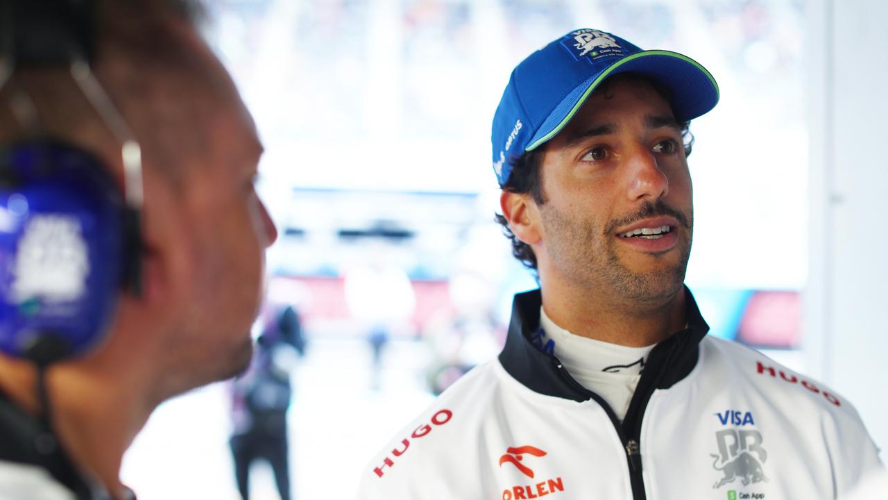 Daniel Ricciardo of Australia and Visa Cash App RB looks on in the garage. (Photo by Peter Fox/Getty Images)