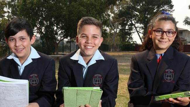 Sebastian Ulizzi, Steven Costi and Maria Farah have plenty of smile about. Picture: Robert Pozo