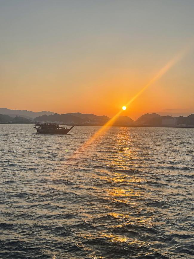 A cruise of Muscat's coastline at sunset. Picture: Natalie Brown/news.com.au