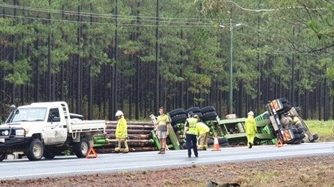 Logging truck rollover on the Tin Can Bay Road, Monday December 14, 2020