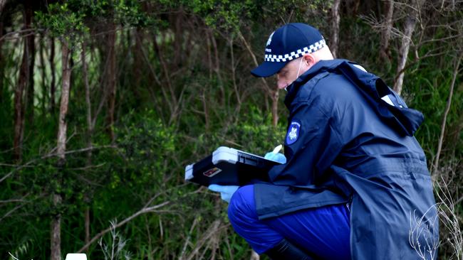 A police officer investigates the death. Picture: Nicole Garmston.