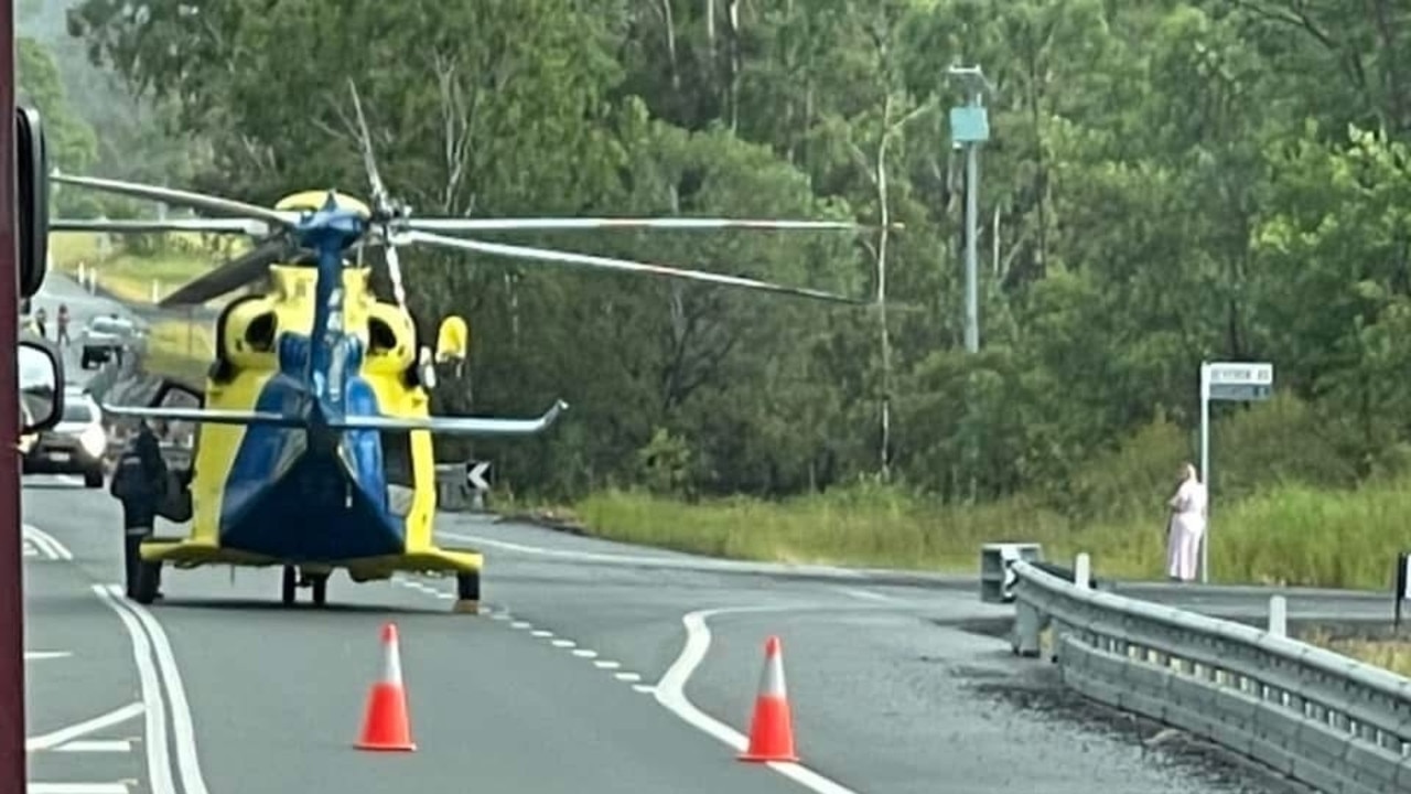 Bruce Highway shut down after truck crashes into barrier