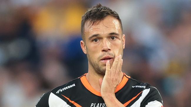 SYDNEY, AUSTRALIA – APRIL 10: Luke Brooks of the Wests Tigers looks dejected during the round six NRL match between Wests Tigers and Parramatta Eels at Accor Stadium on April 10, 2023 in Sydney, Australia. (Photo by Mark Metcalfe/Getty Images)