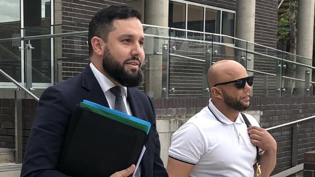 Solicitor Fadi Abbas with his client Ali Elskaf outside Liverpool Local Court on April 8, 2020.