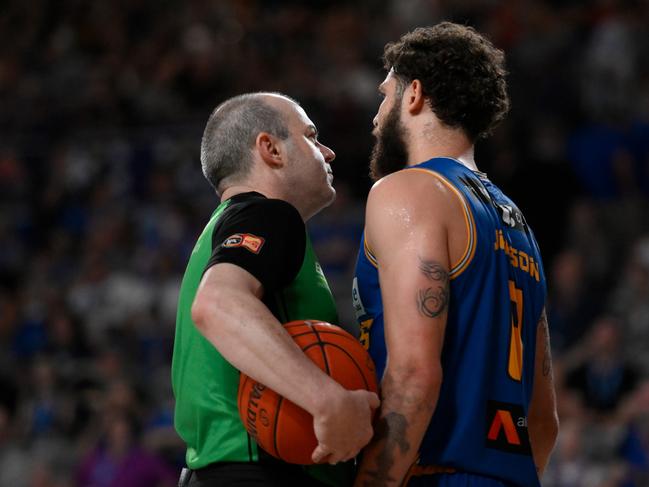 Tyler Johnson speaks with the referee during the round 9 NBL match between Brisbane Bullets and Tasmania JackJumpers at Nissan Arena. Photo: Matt Roberts/Getty Images.