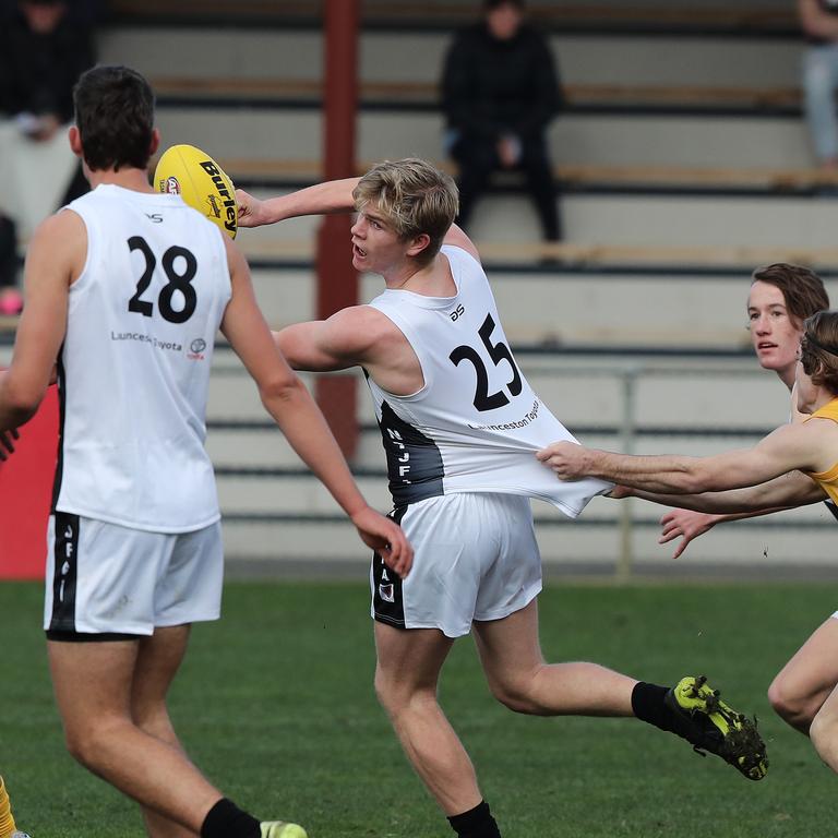 Under 16 Boys STJFL vs. NTJFA match, North Hobart Oval: North's Cody Jones passes by hand. Picture: LUKE BOWDEN