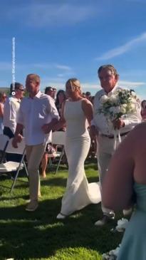 Why this bride had 15 men walk her down the aisle