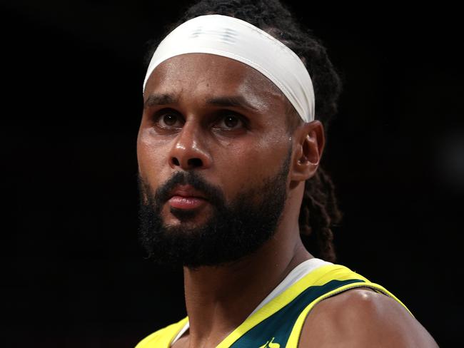 SAITAMA, JAPAN - AUGUST 05: Patty Mills #5 of Team Australia looks on following Team Australia's loss to Team United States in a Men's Basketball quarterfinals game on day thirteen of the Tokyo 2020 Olympic Games at Saitama Super Arena on August 05, 2021 in Saitama, Japan. (Photo by Kevin C. Cox/Getty Images)